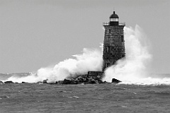 Waves Crashing Around Whaleback Lighthouse Tower in Maine